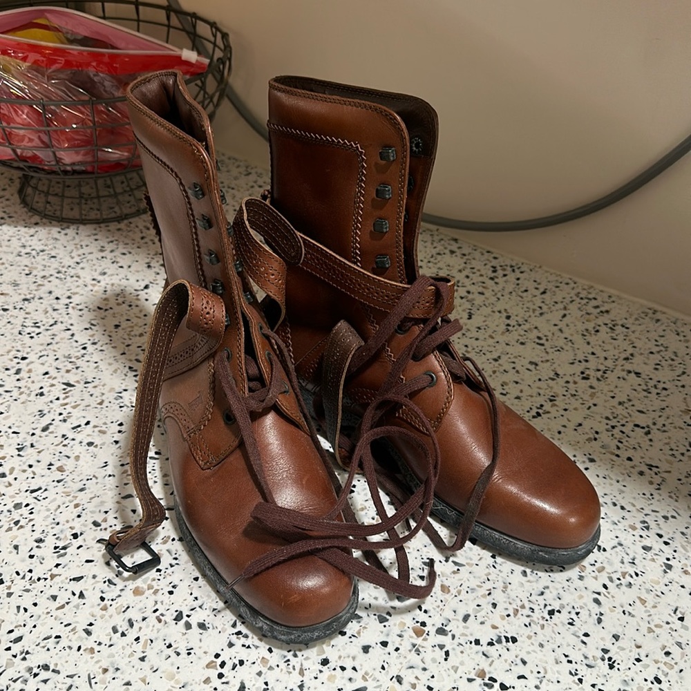 Tods woman’s lace up and buckle boots
